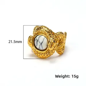 French vintage snake ring in gold-plated steel with marble stone inlay and scale texture