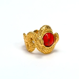 French vintage snake ring in gold finish with a large red turquoise stone inlay