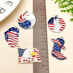 Detailed macro shot of USA patriotic enamel charms for DIY keychains and jewelry