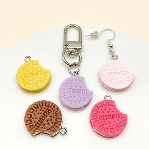 Macro view of colorful resin sandwich biscuit charms for keychains and earrings