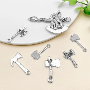 Set of 7 vintage silver alloy axe charms with dragon relief for DIY jewelry making