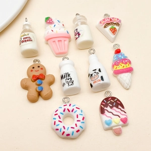 Assorted cute resin food charms for DIY keychains featuring donuts and milk bottles