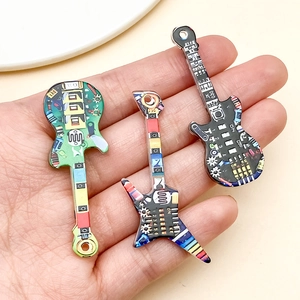 Detailed macro of acrylic electric guitar pendants with colorful abstract circuit patterns