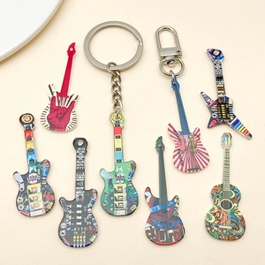 Detailed macro view of colorful acrylic guitar pendants with graffiti art patterns
