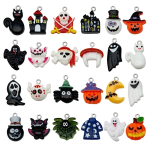 24-piece Halloween resin charms set featuring pumpkin, ghost, and bat shapes with loops