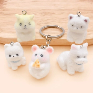 Five styles of flocked cartoon animal charms featuring cute puppy and hamster designs