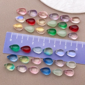 Perline colorate in vetro a forma di goccia d'acqua con righello graduato