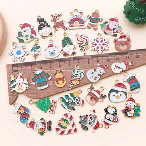 Colorful Christmas enamel charms assortment with Santa, reindeer and tree for DIY jewelry