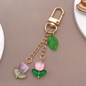 Detail of tulip pendants with leaves and lobster clasp for DIY jewelry making