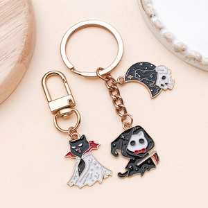 Detail of Halloween vampire cat and skeleton moon enamel alloy charms with lobster clasp