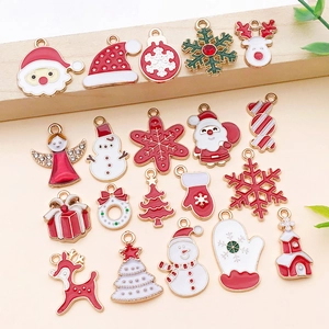 Macro shot of assorted Christmas enamel alloy charms with festive red and gold holiday designs