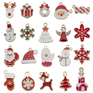 Set of 20 assorted Christmas enamel charms including Santa, reindeer, and snowflakes