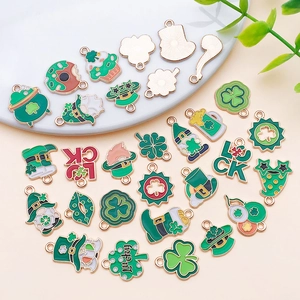 Variety of St. Patrick's Day enamel charms including lucky shamrocks and gold pots