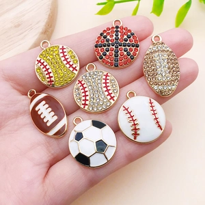Macro detail of sports charms with enamel finish and sparkling rhinestones for DIY jewelry