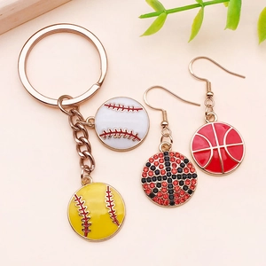 Detail showing sports charms including enamel basketball earrings and baseball keychains