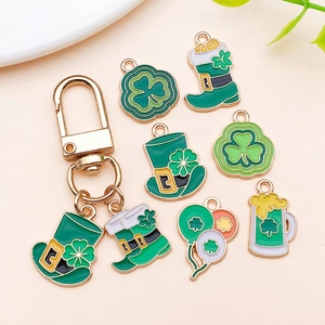 Detail of St. Patrick's Day green enamel charms with clover, hat and lucky boot symbols