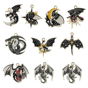 Set di 10 ciondoli a forma di drago in lega vintage con motivi smaltati di luna e stelle
