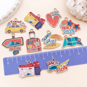 Travel theme enamel charms set featuring suitcase and map for DIY jewelry making