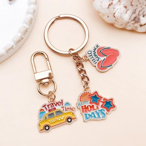 Detailed travel charms featuring yellow taxi and red flip-flops with Hello Summer text