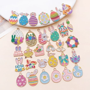 Detailed view of enamel Easter bunny and egg charms for DIY bracelet jewelry making