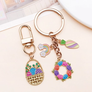 Detail of Easter basket and rainbow enamel pendants on gold-plated zinc alloy keychains
