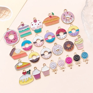 Detailed assortment of colorful enamel dessert pendants for DIY jewelry making and crafts