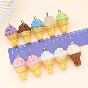 Detailed close-up of 2.5cm colorful resin ice cream charms with metal loops for DIY