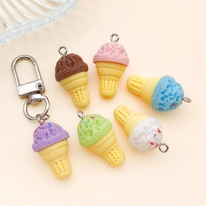 Detailed macro view of six colorful resin ice cream cone pendants with lobster clasps