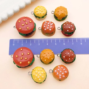 Size comparison of mini resin hamburger charms with ruler showing 1.5cm to 2.8cm