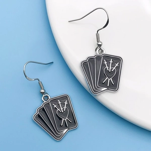 Gothic sword pierced heart tarot earrings in silver metal and black oil drip finish