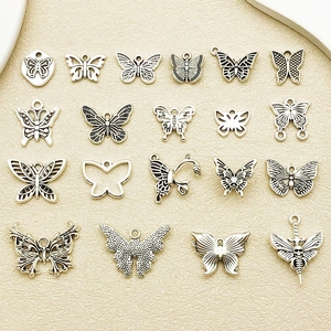 Variety of vintage silver butterfly alloy charms for DIY jewelry and keychain making