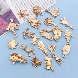 Christmas themed KC gold zinc alloy charms including snowman and reindeer for DIY jewelry