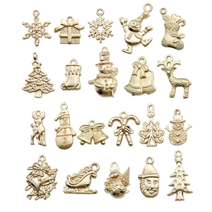 20-piece gold zinc alloy Christmas charms set featuring reindeer, snowflakes and bells