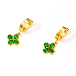 Detail view of 18K gold plated earrings with S.STEEL stamp and green pear-cut zirconias