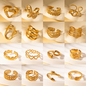 Detailed grid of sixteen vintage gold titanium steel rings in various fashion designs