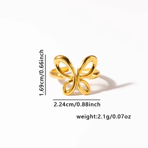 Detail view of gold butterfly ring with dimensions 1.69cm height and 2.1g weight