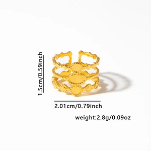 Detail of vintage gold plated triple-layer open ring with geometric patterns and dimensions