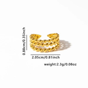 Macro view of gold stacked triple-layer beaded open ring with size dimensions 0.35inch