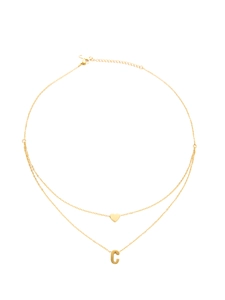 Close-up of double-layered gold-plated titanium necklace with letter C and heart charm