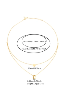 Detailed technical drawing of double-layered gold necklace with heart and C letter pendant