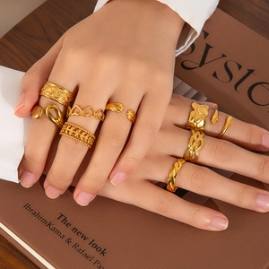 Set of 18K gold plated stainless steel rings featuring hollow heart and wheat designs