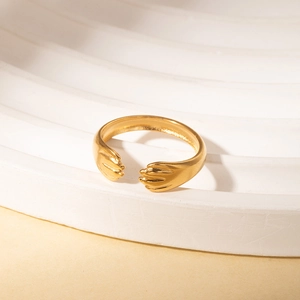 Detailed close-up of a vintage French style gold hug ring made of durable titanium steel