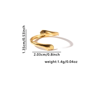 Detail shot of golden hug ring showing dimension specs of 1.35cm height and 1.4g weight