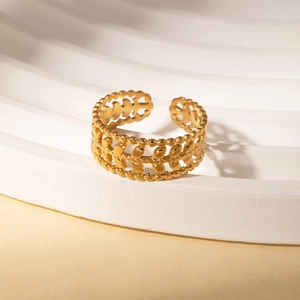 Detailed macro of gold vintage wheat ear adjustable ring with bead edge detailing