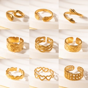 French vintage titanium steel gold rings collection featuring nine assorted minimalist designs
