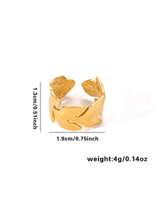 Detailed view of leaf shaped ring showing 1.3cm height and engraved golden metal textures