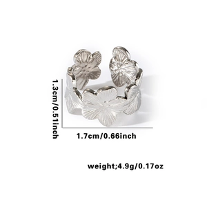 Adjustable silver floral open ring in stainless steel with textured flower petal design