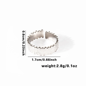 Detail shot of vintage silver ring showing 0.6cm width and 1.7cm diameter measurements