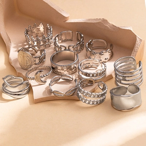 Set di 12 anelli geometrici in acciaio inossidabile argento con texture irregolari