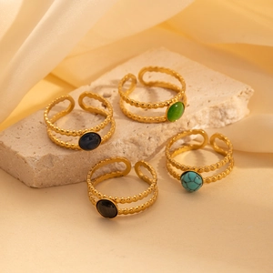 Set de cuatro anillos de doble capa de acero 304 dorado con diversas piedras naturales